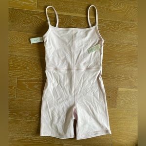 Aritzia Divinity 7” romper in Lilac Bloom, Medium